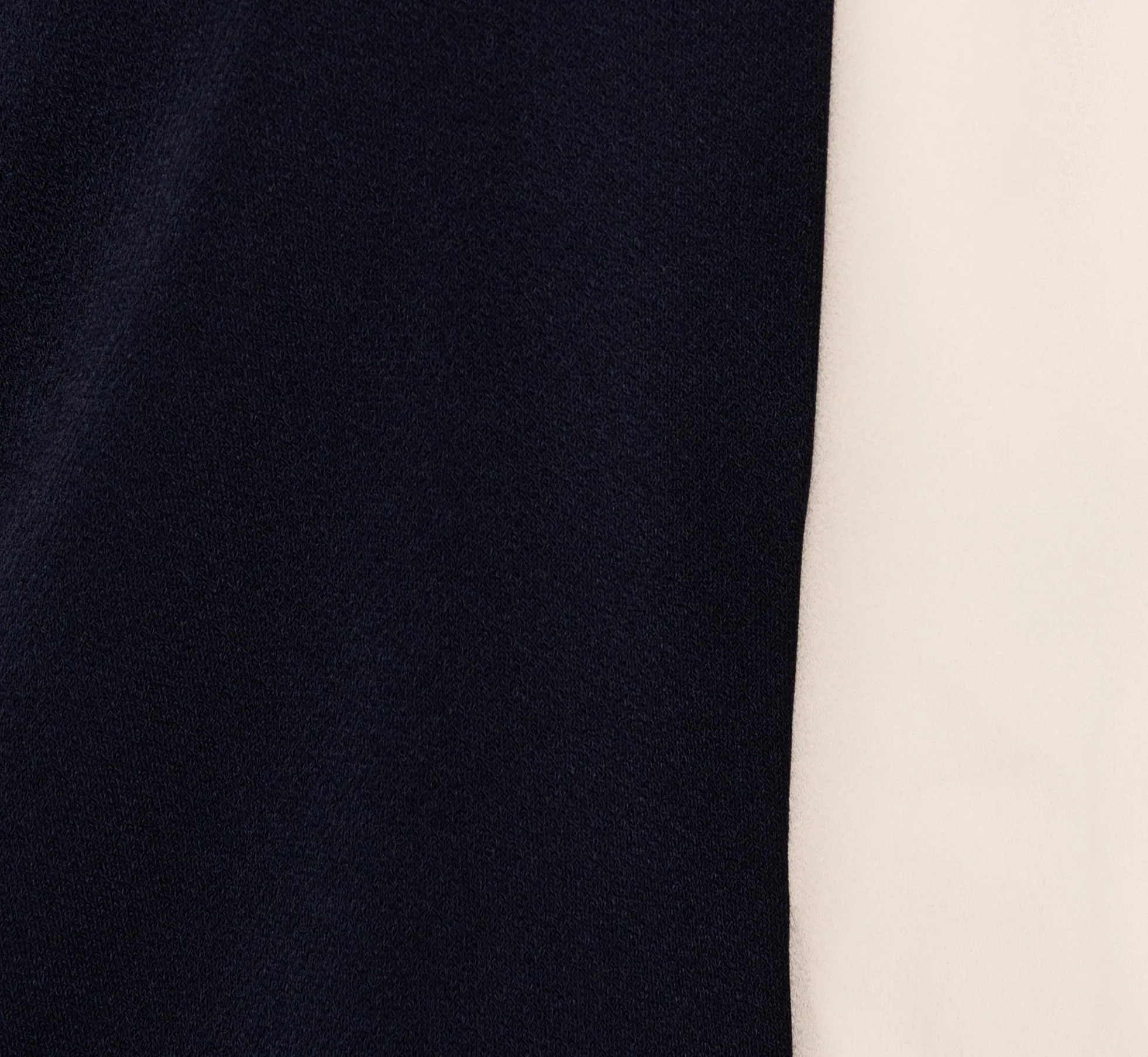Flutter Sleeve Tie Neck Knit Top In Navy Ivory