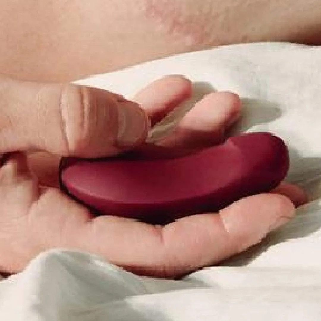 Pom Hand Held Flexible Silicone Vibrator by Dame Products - Plum