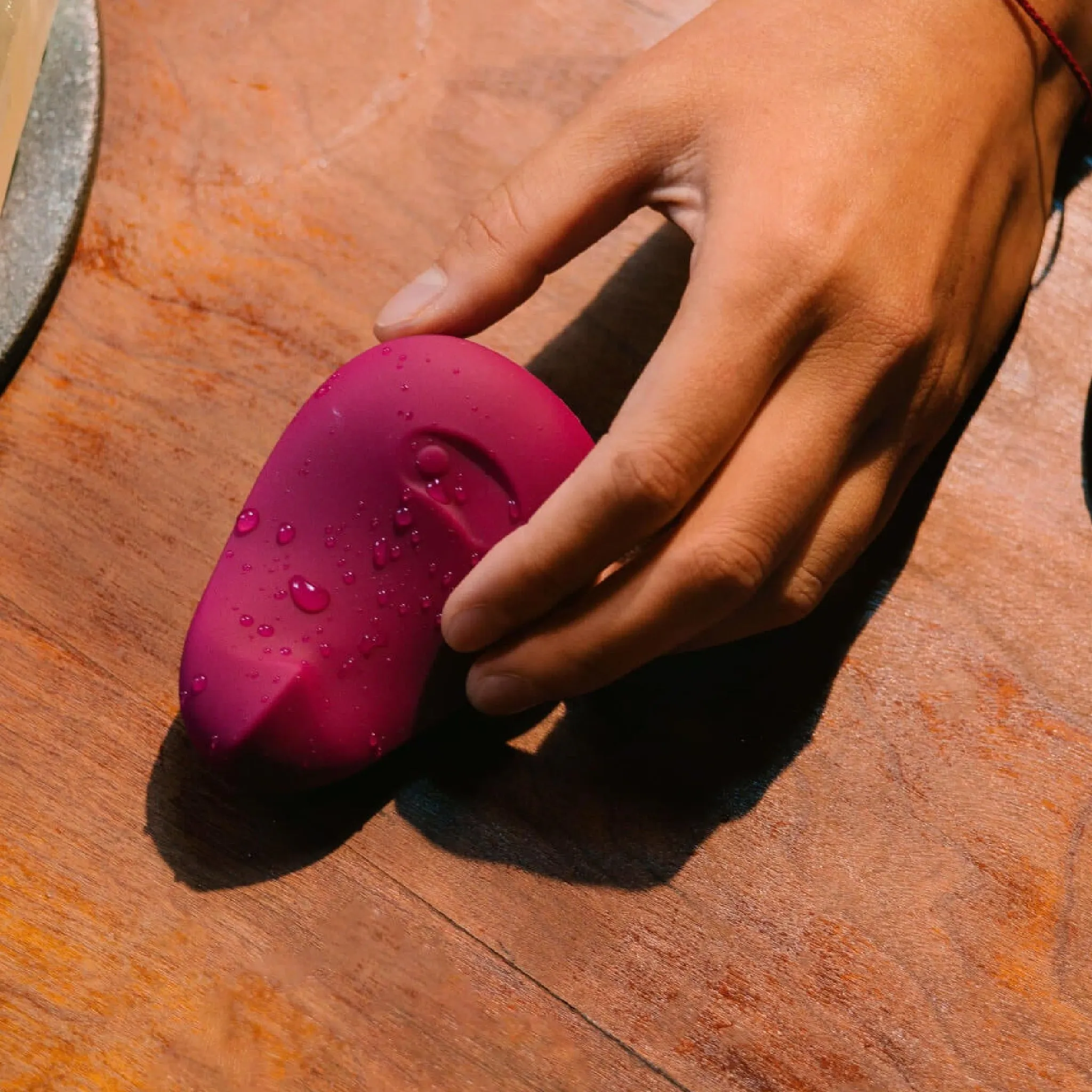 Pom Hand Held Flexible Silicone Vibrator by Dame Products - Plum